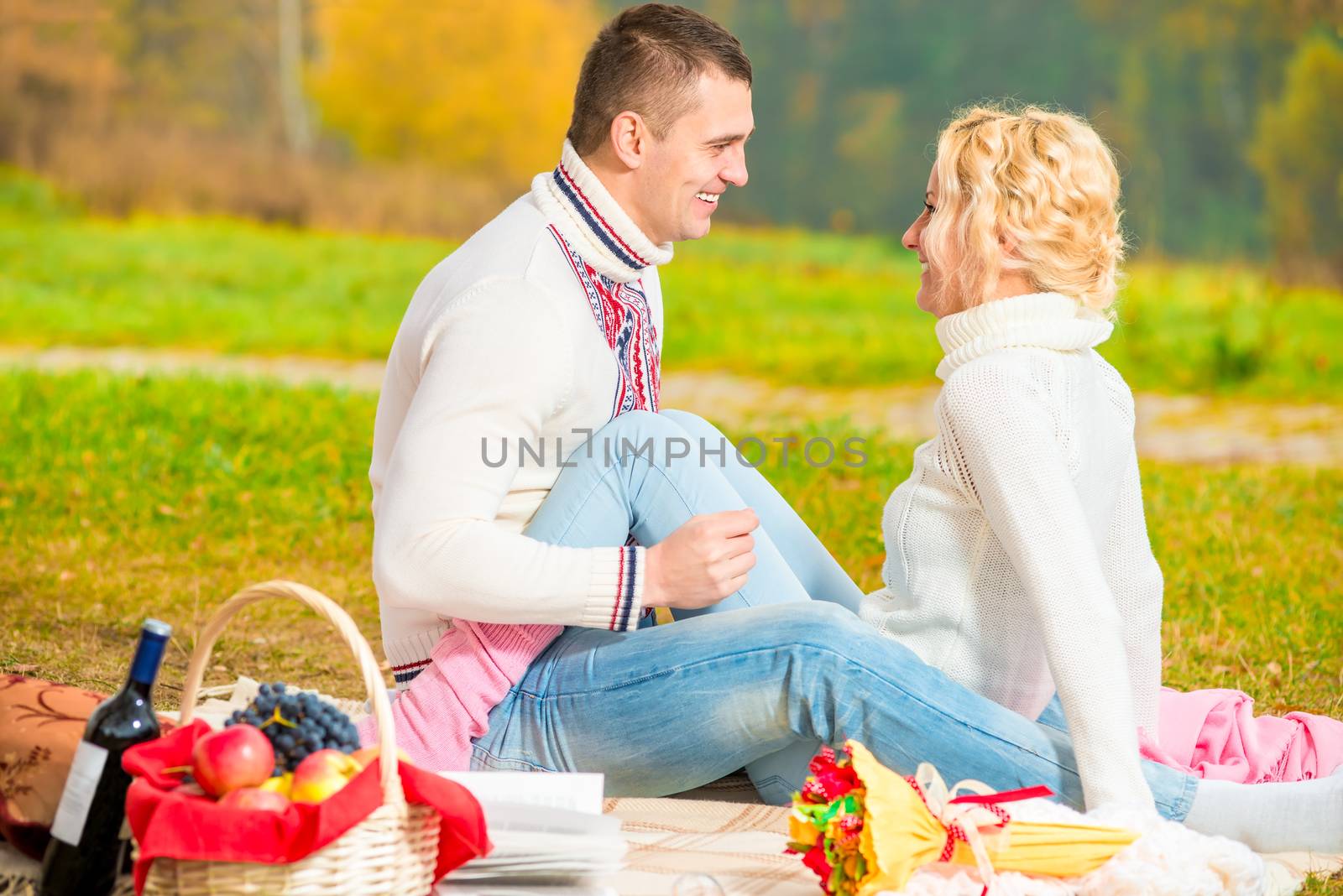 girl and her boyfriend at a picnic have fun weekend