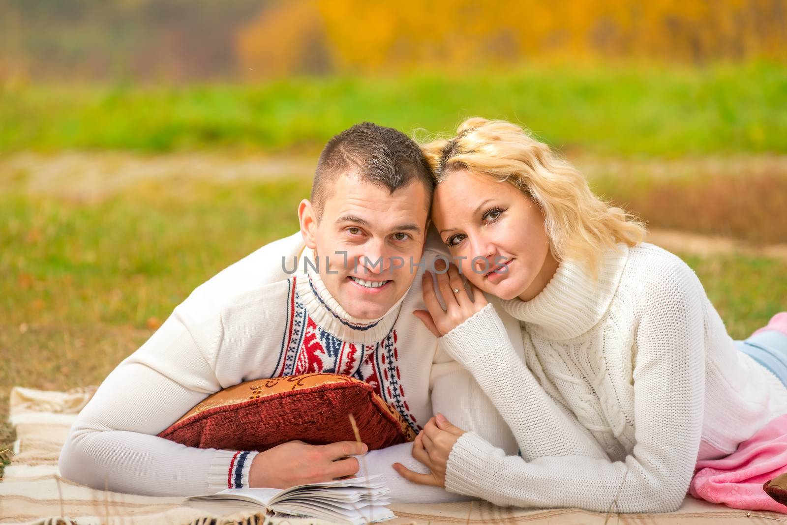 happy faces of of people in love on a picnic