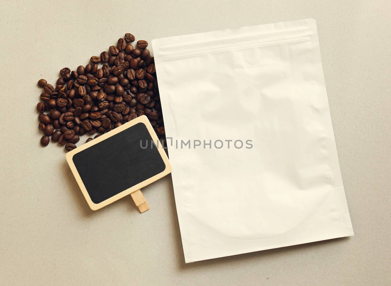 Bag of coffee and blank blackboard with coffee beans, retro filt by nuchylee