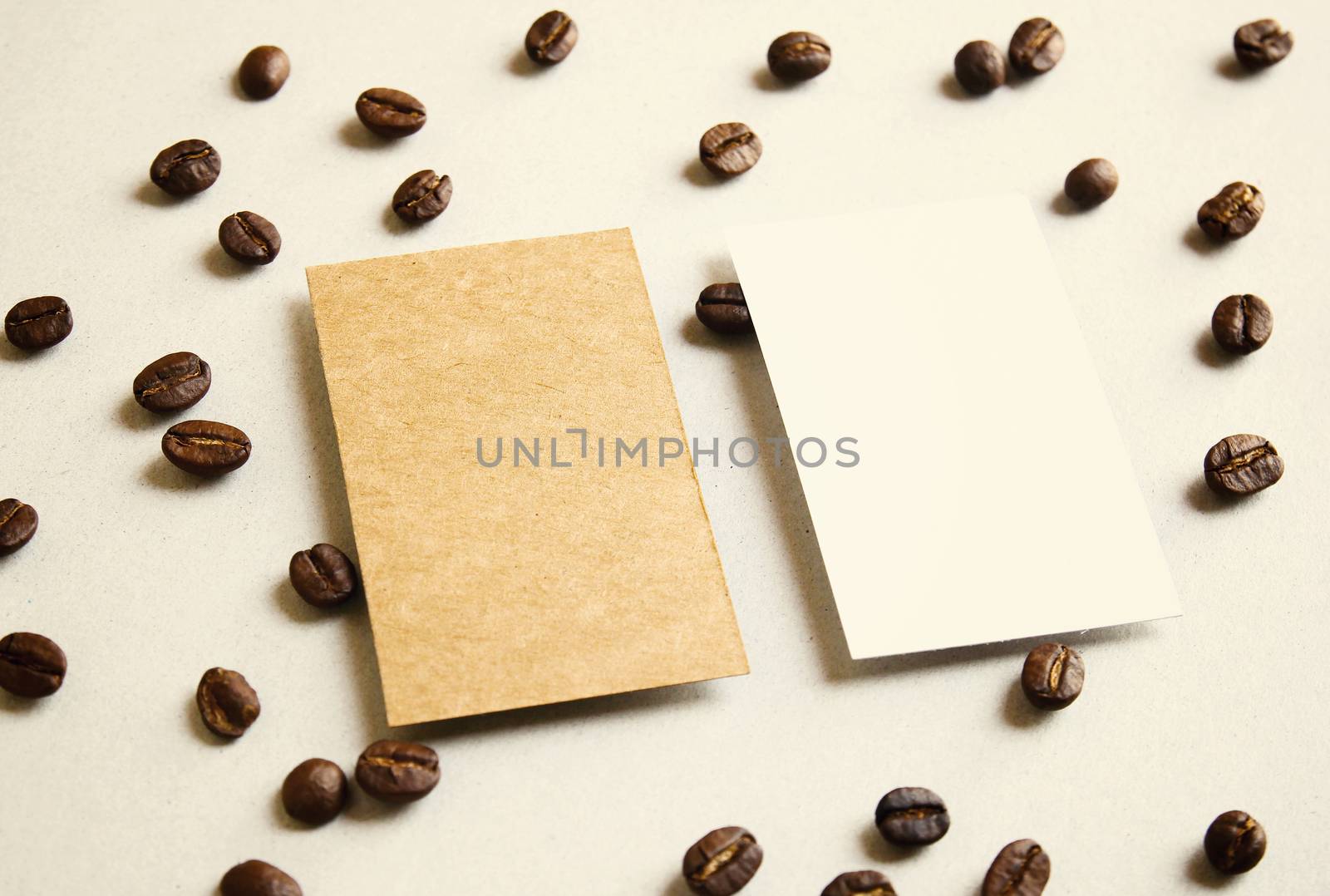 Blank business name card on coffee beans with retro filter effec by nuchylee