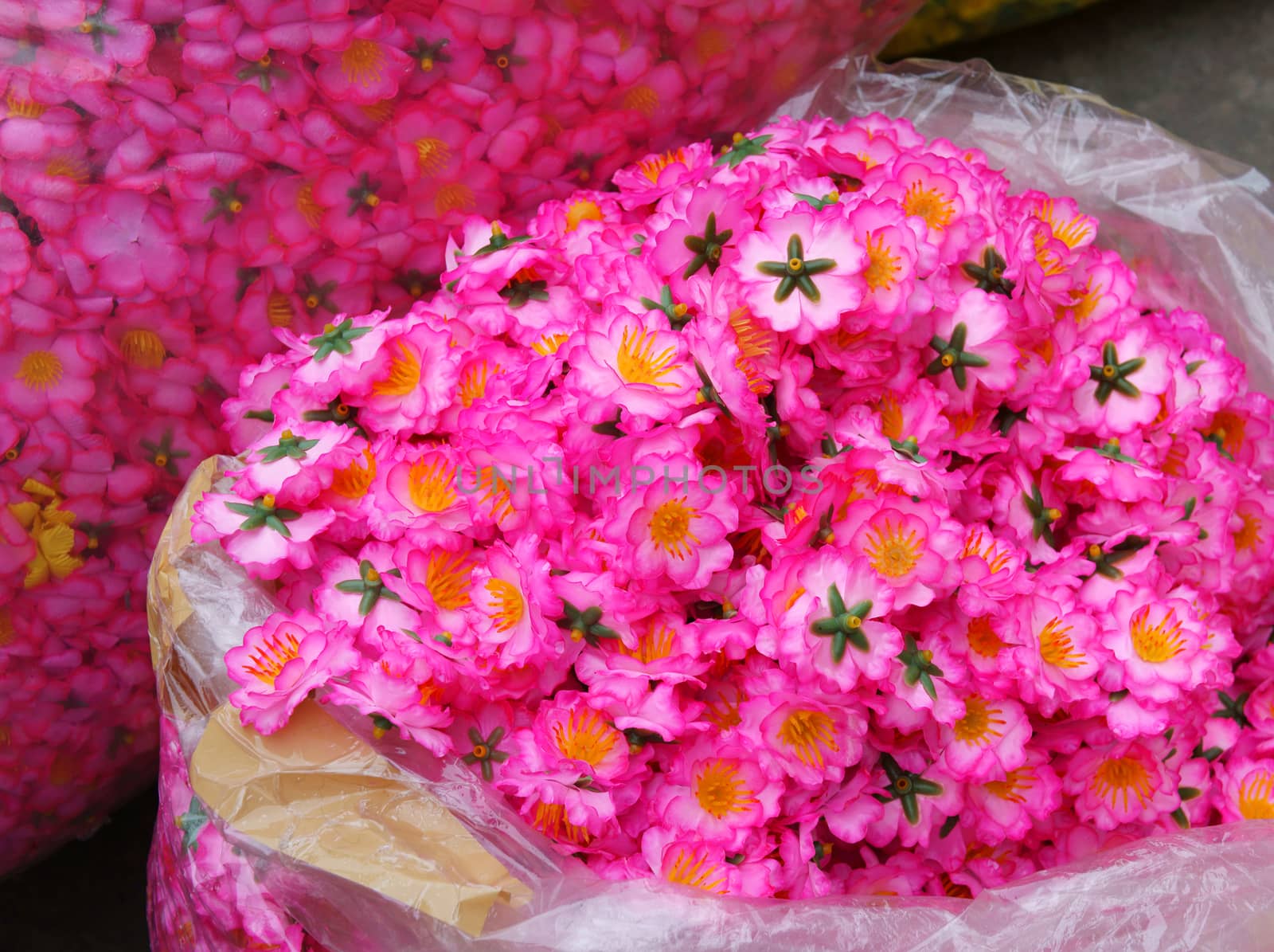 Colourful raw materiral decoration to decorate for house on New Year seasonal at Vietnam, Vietnamese like sakura blossom on Tet and use artificial flower to make beautiful for tree