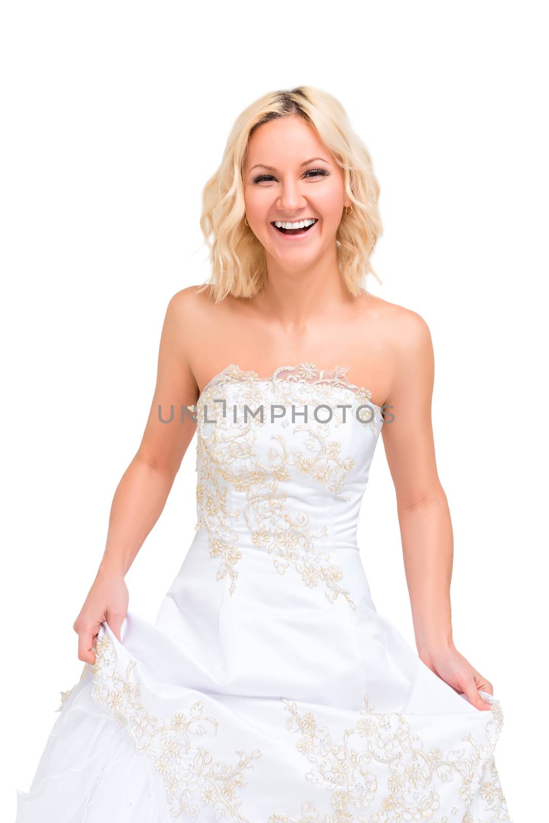 laughing woman in a wedding dress posing