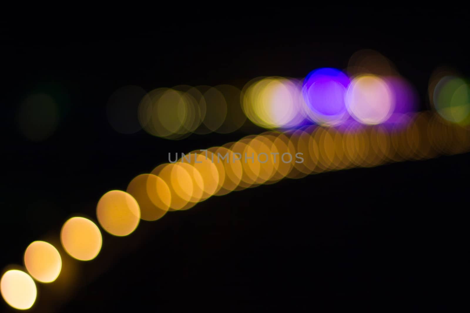 Abstract circular bokeh background of lights in the night.