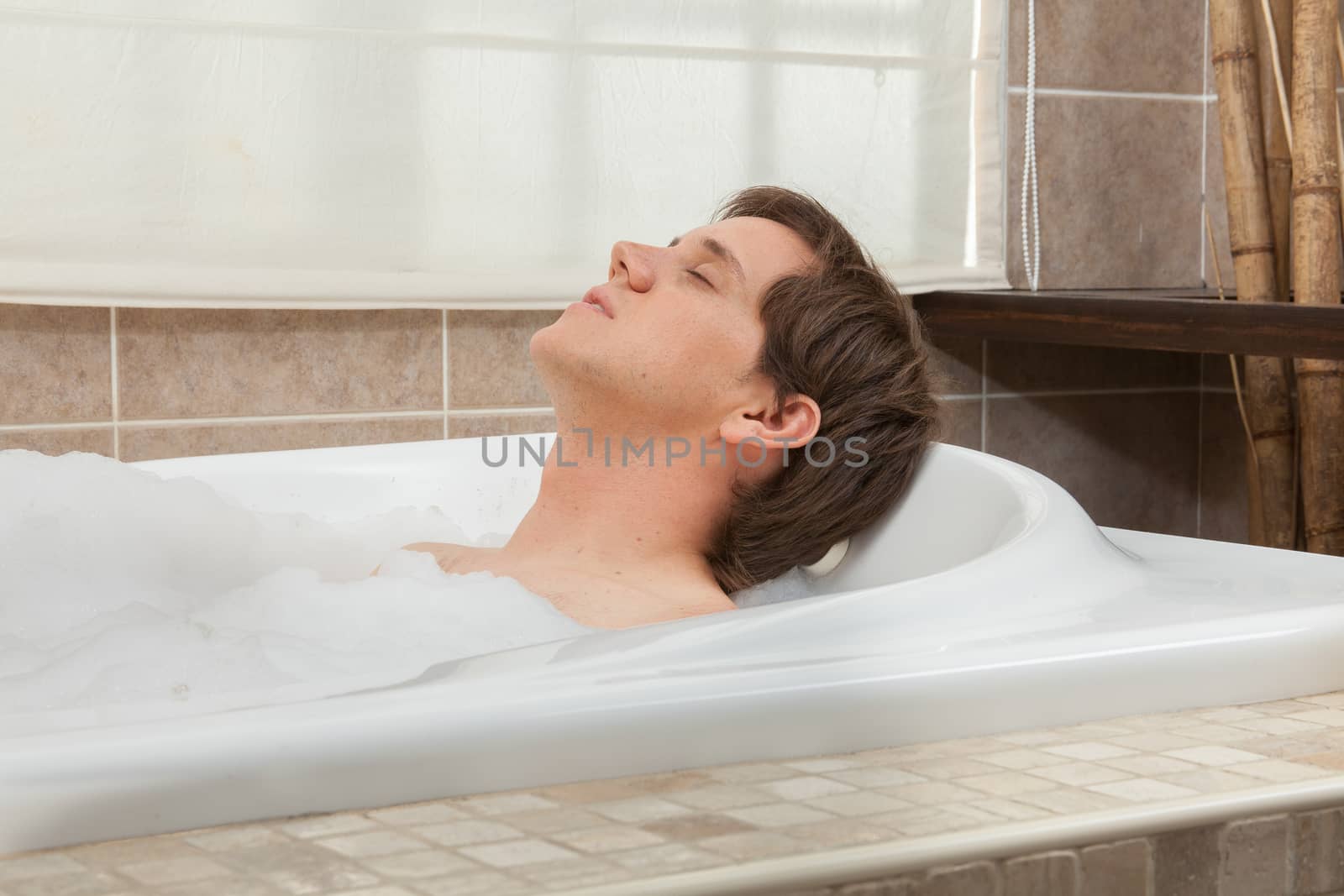 Man relaxed in the tub