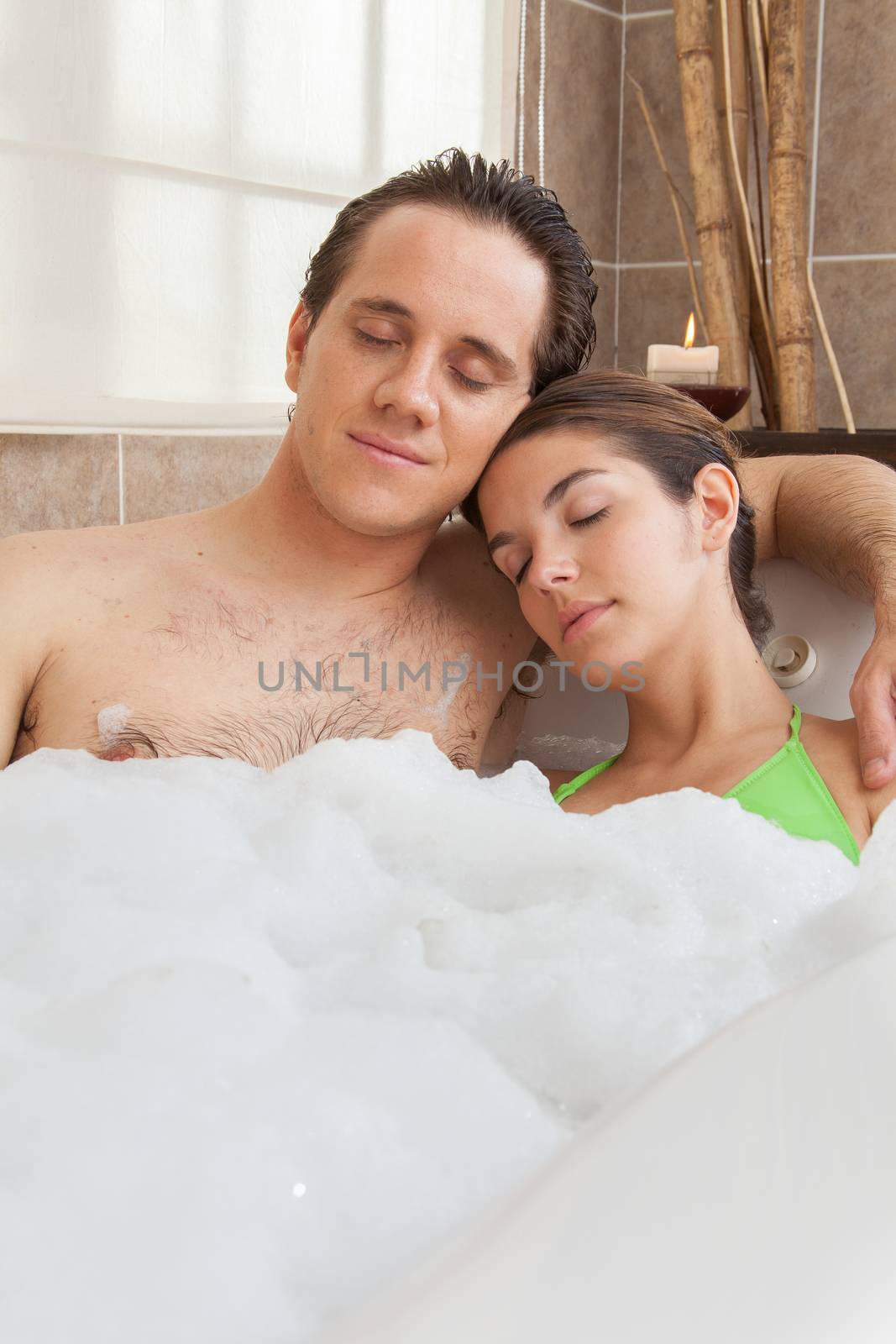 Couple resting in the bathtub