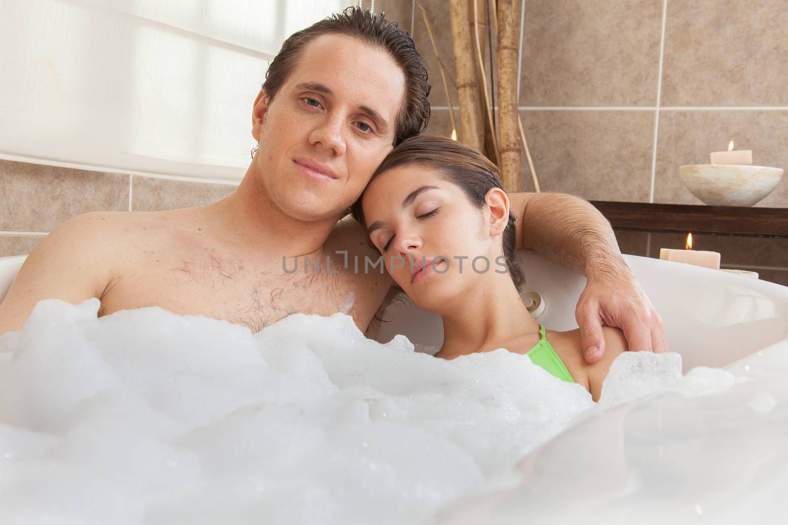 Couple resting in the bathtub