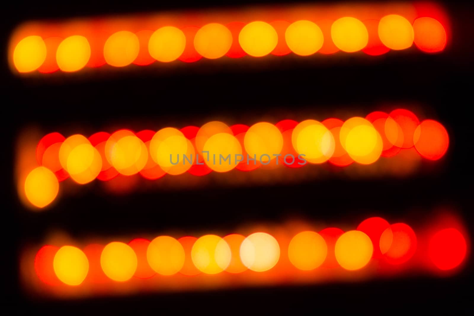 Abstract red and orange circular lines bokeh background of Christmas light