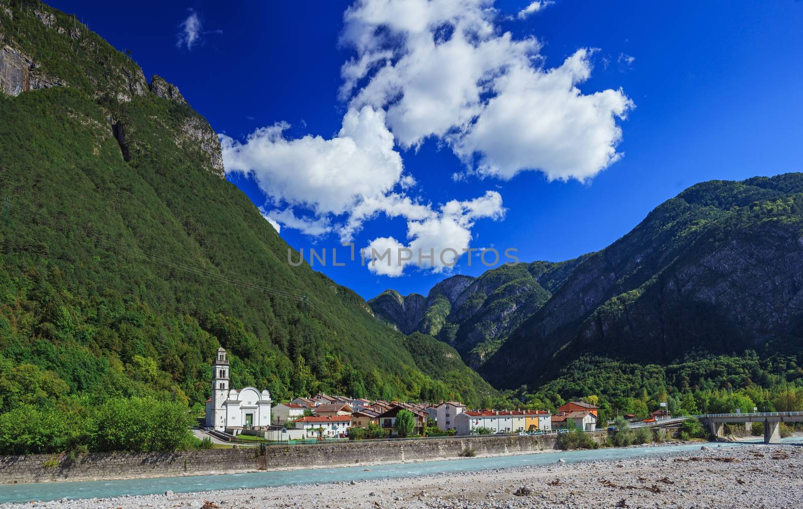 River, village and beautiful mountains view, South Tirol, Dolomiti Mountains, Italy