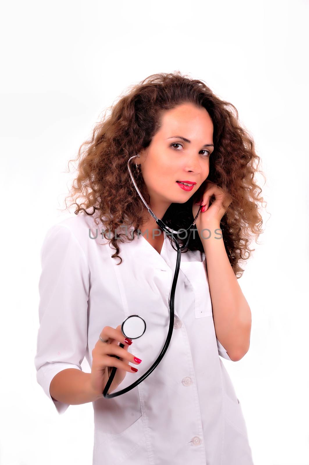 Young beautiful successful female doctor with stethoscope by Nikola30