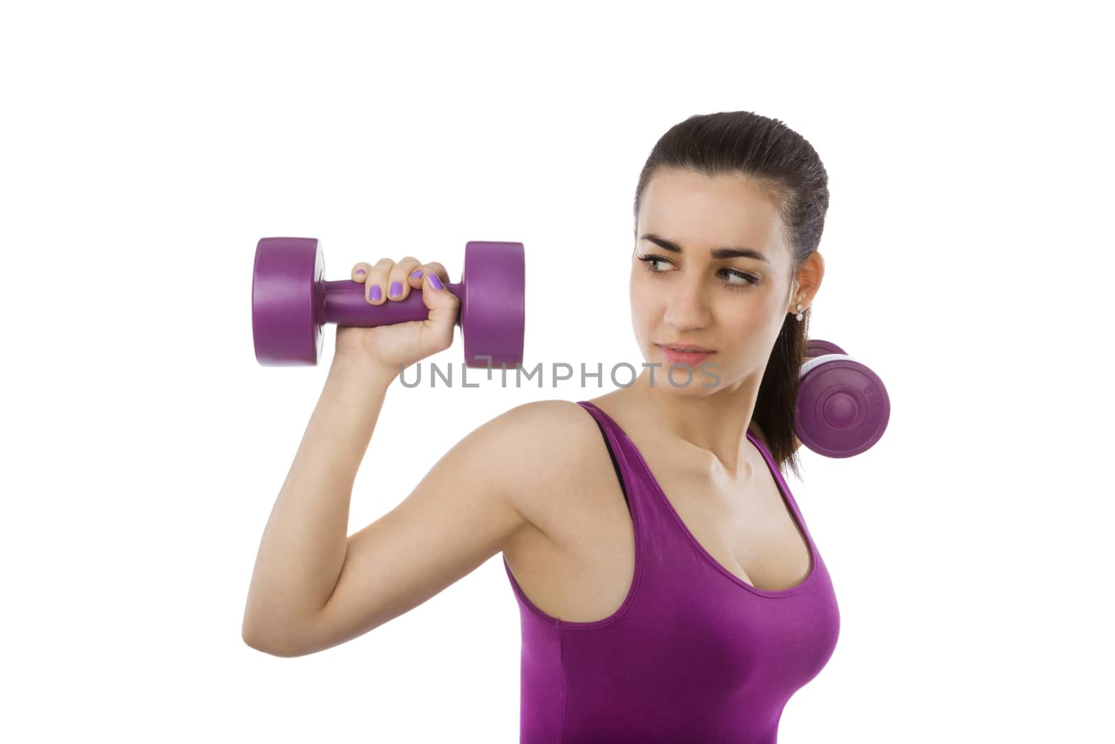 Beautiful girl with purple top and purple dumbbells isolated on white background. Sport and fitness, healthy living.