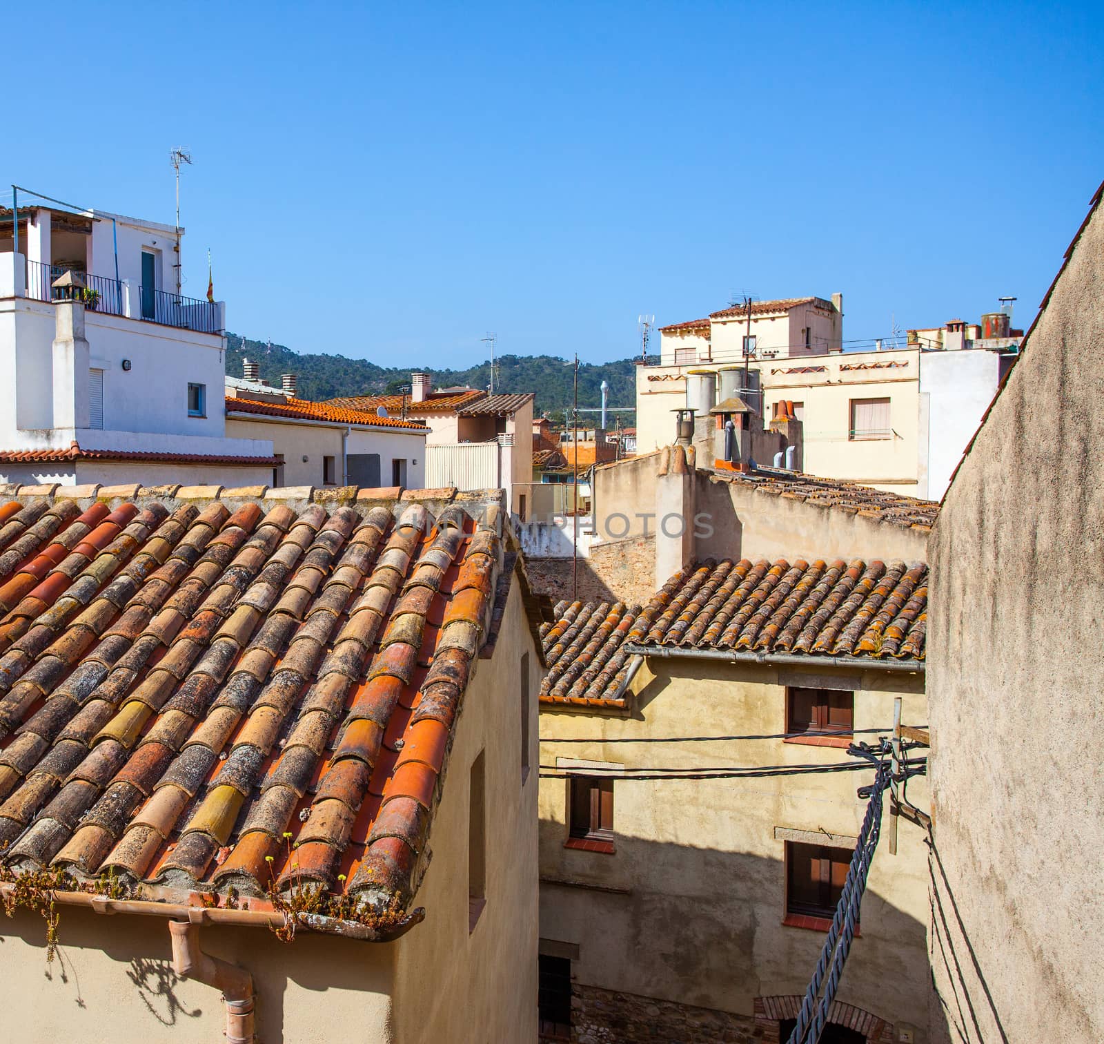 Tossa de Mar, Catalonia, Spain, 06.17.2013, roofs of houses in the old town on the Mediterranean coast