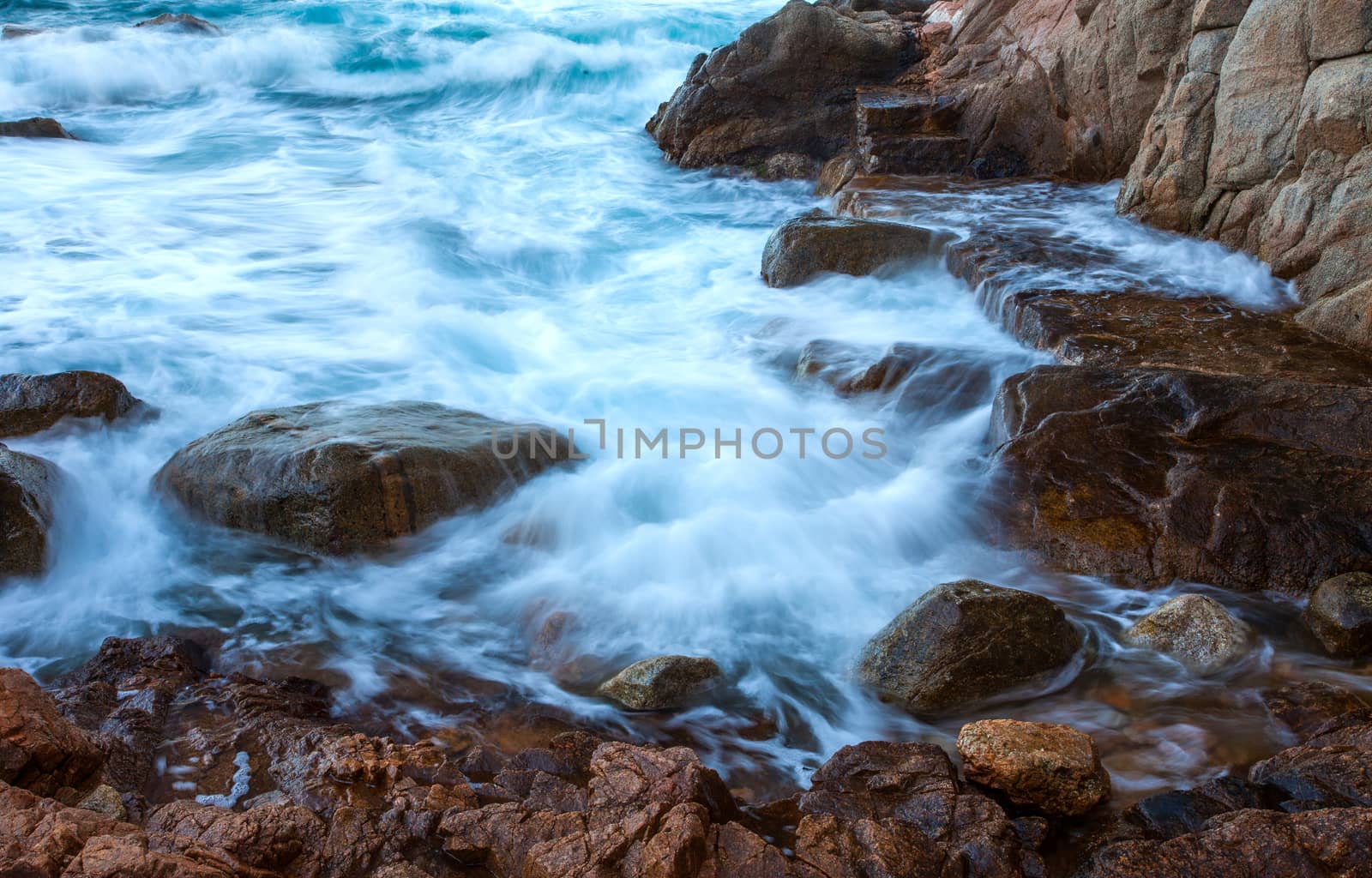 waves of the sea and coastal rocks by Astroid