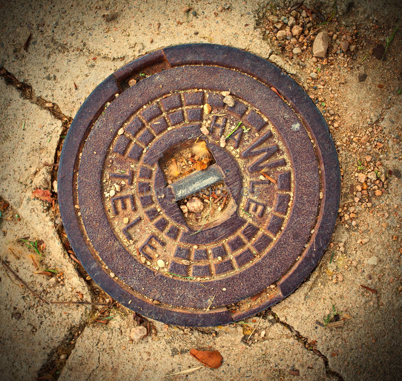 manhole cover in Tossa de Mar, Catalonia, Spain, instagram image style