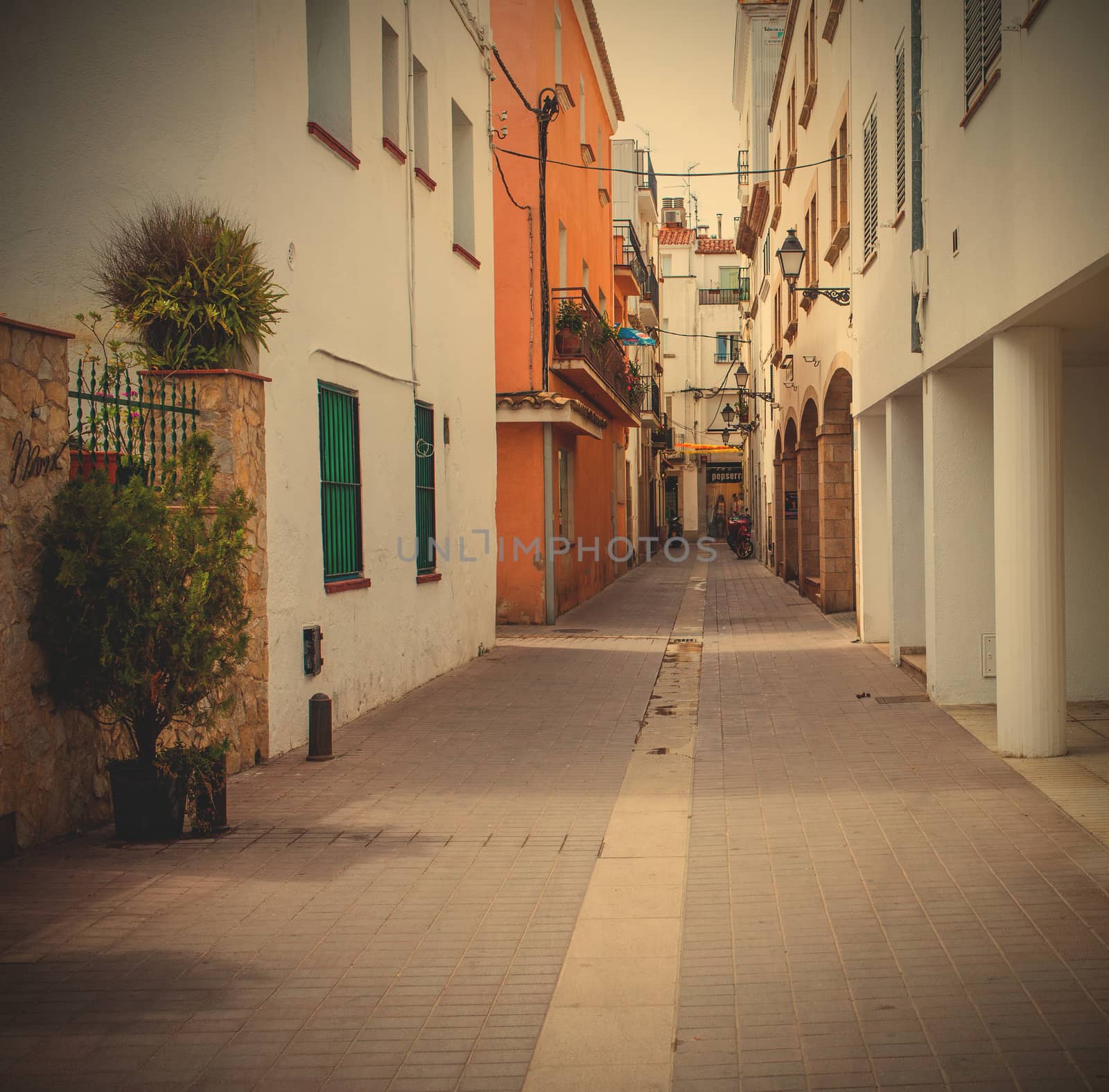 Tossa de Mar, Spain, ancient street at summer day by Astroid