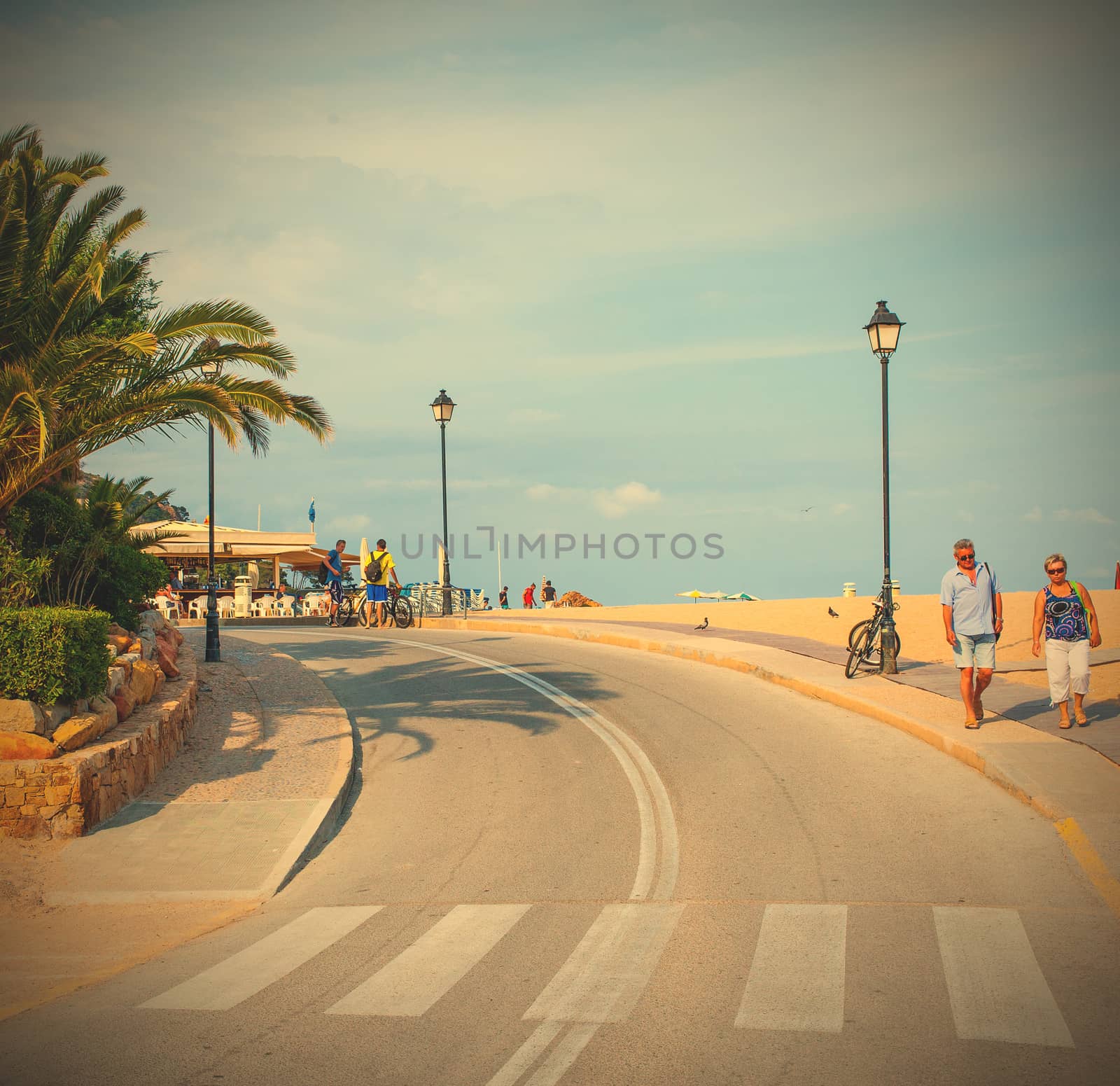 Tossa de Mar, Catalonia, Spain JUNE 21, 2013: Avenida Palma street near Gran Platja beach. Instagram image style