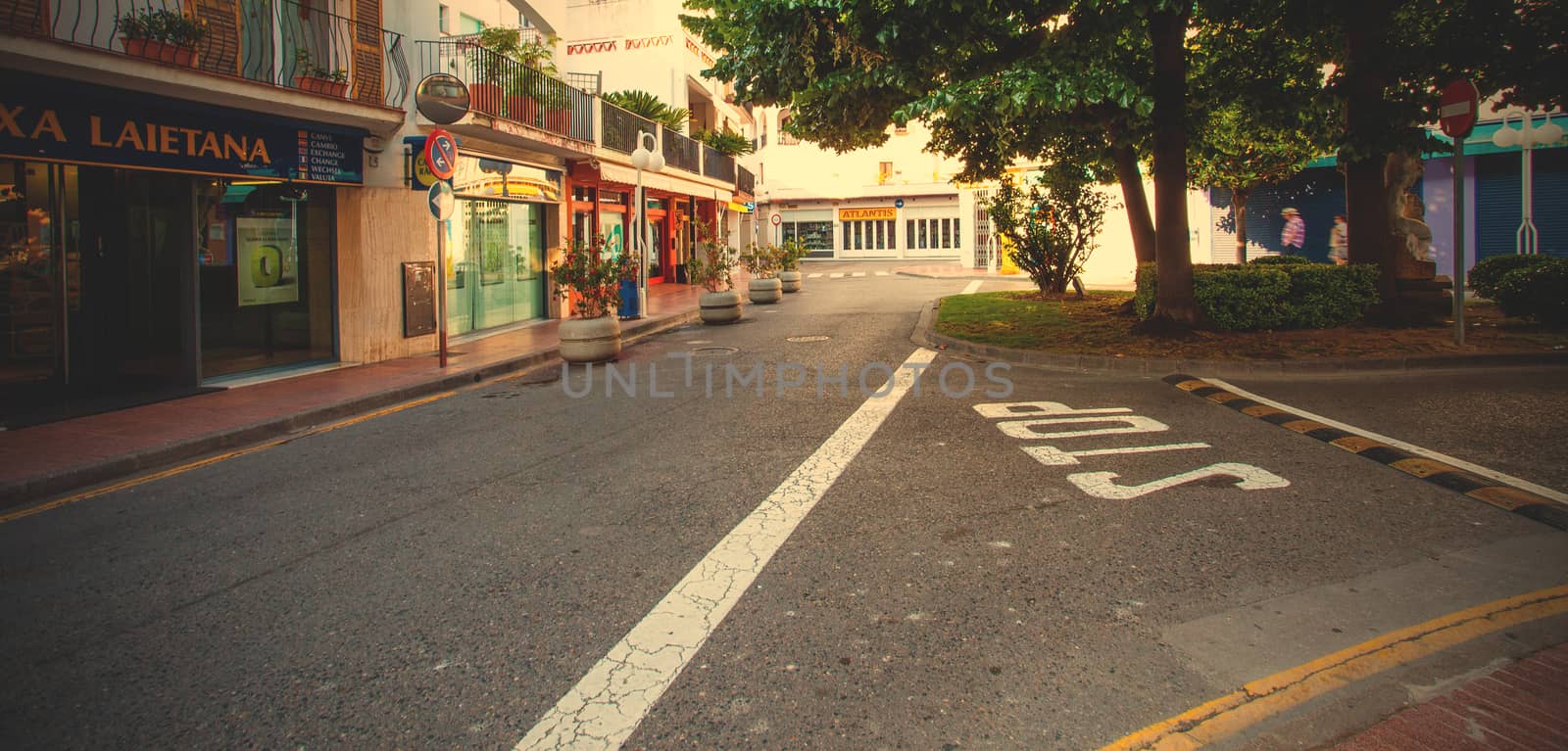 Tossa de Mar, Catalonia, Spain, June 23, 2013: crossroad in the little town at summer early morning. instagram image style