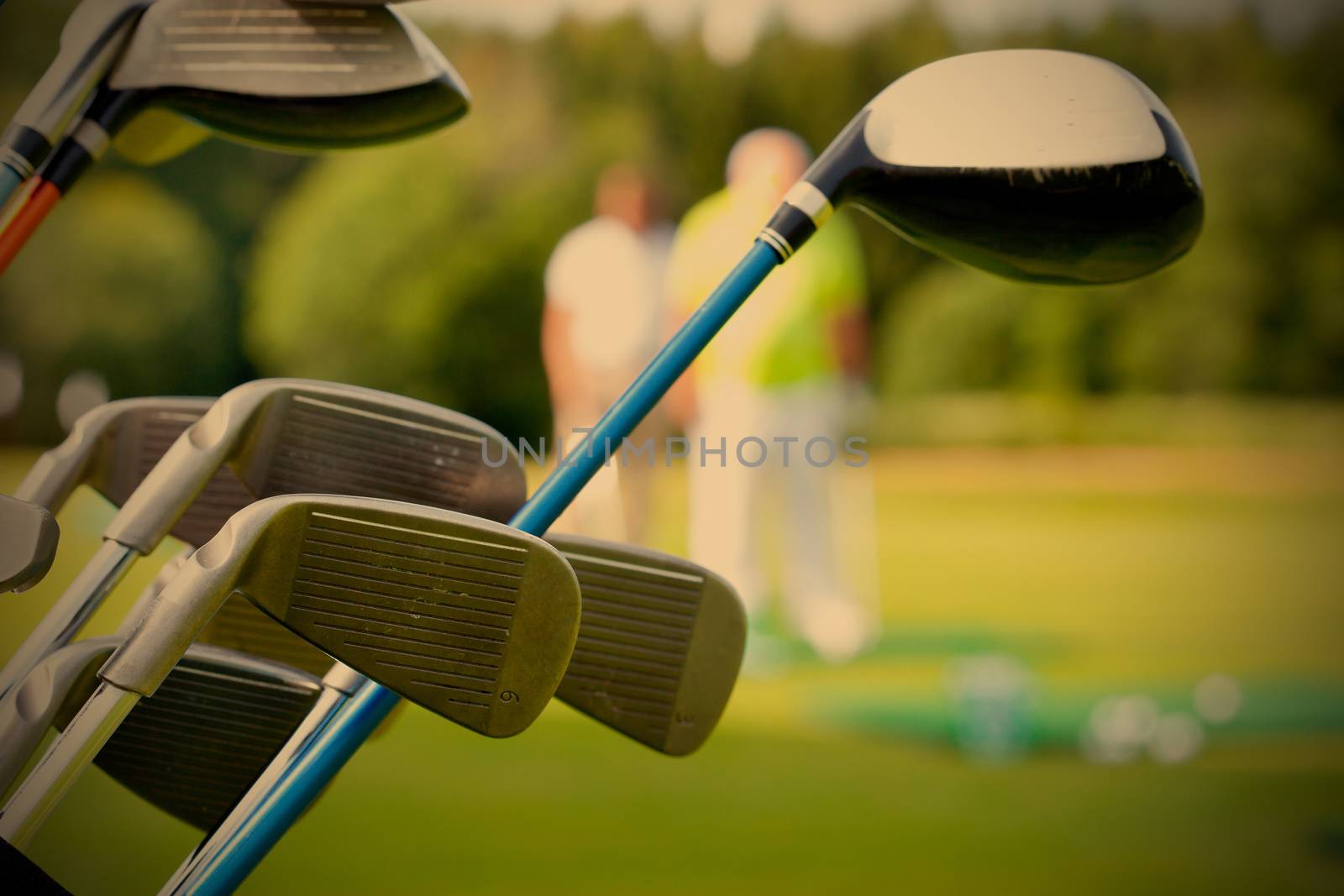 golf club against the background of green field, instagram image style