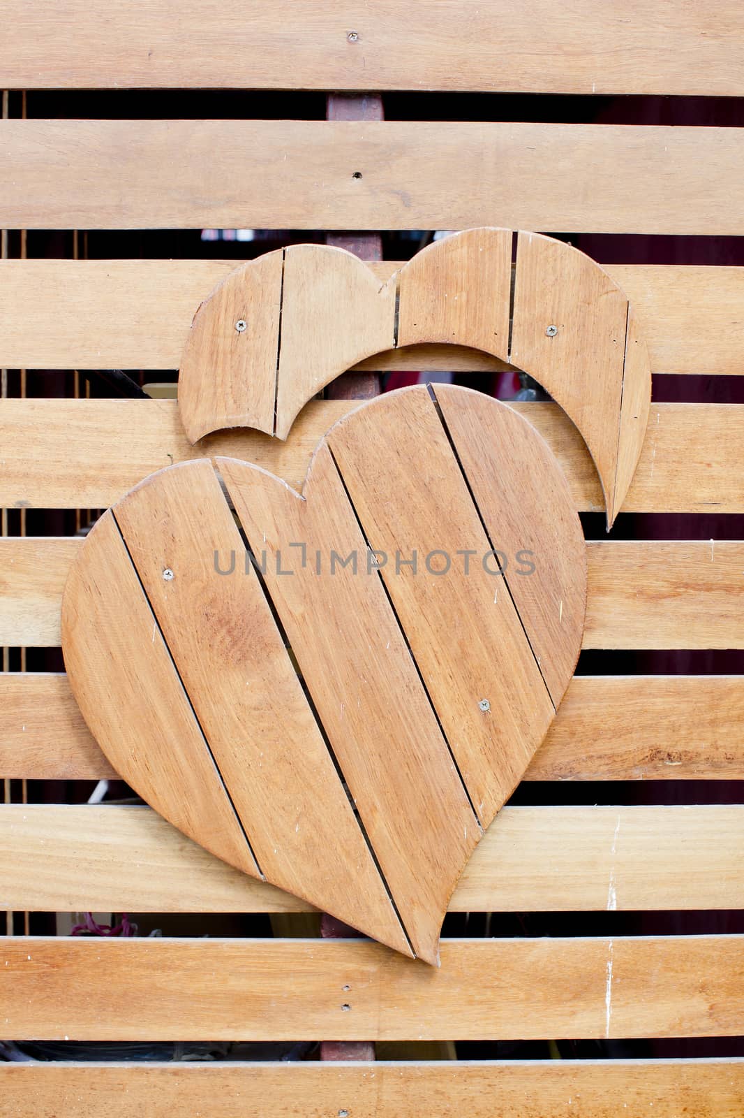 Wooden with heart shape on grunge wooden