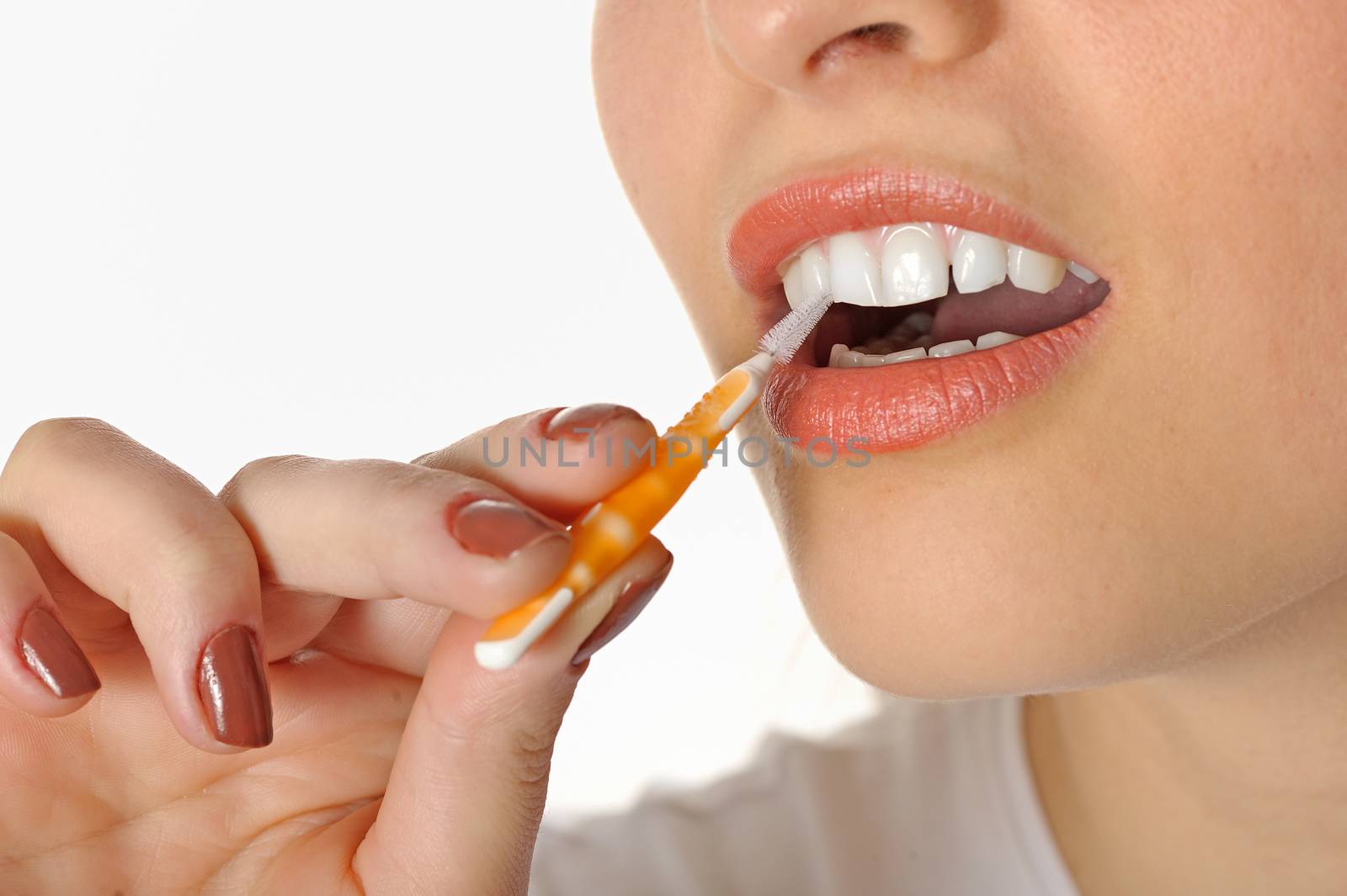 girl using Interdental Brushes