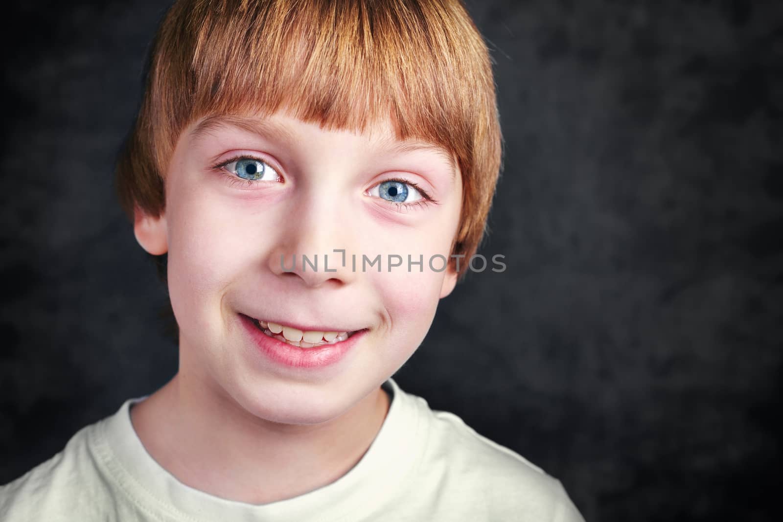 Handsome smiling boy in front  by anelina