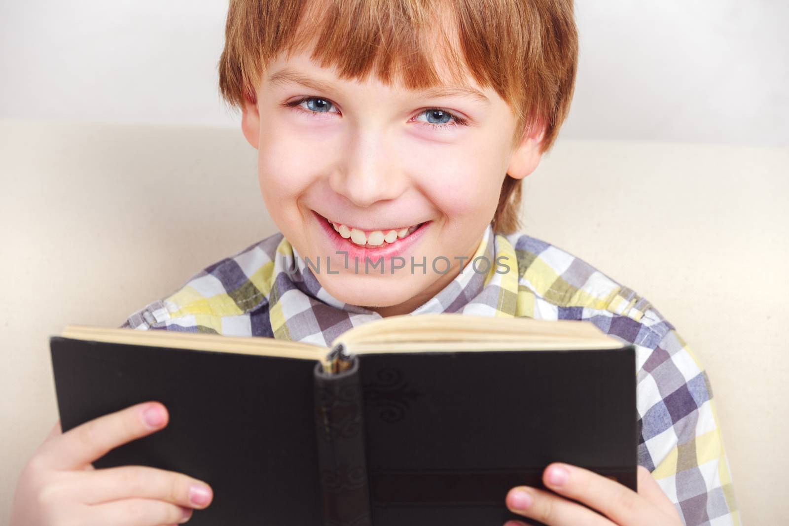 boy studying the scriptures. by anelina