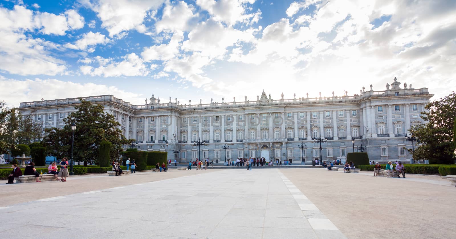 Madrid, Spain - May 6, 2012: Royal palace (Palacio Real de Madrid) with tourists on a spring day in Madrid, Spain