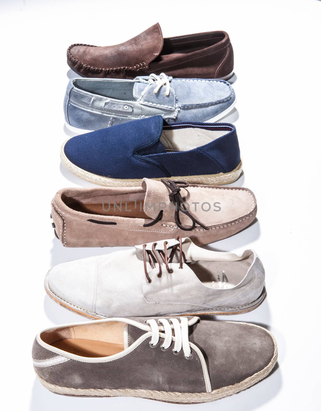 Set of trendy man footwear on a white background