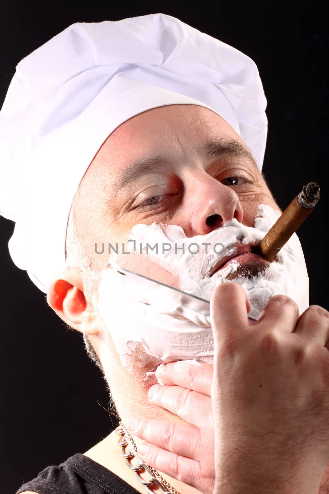chef shaves with chopper by alexkosev