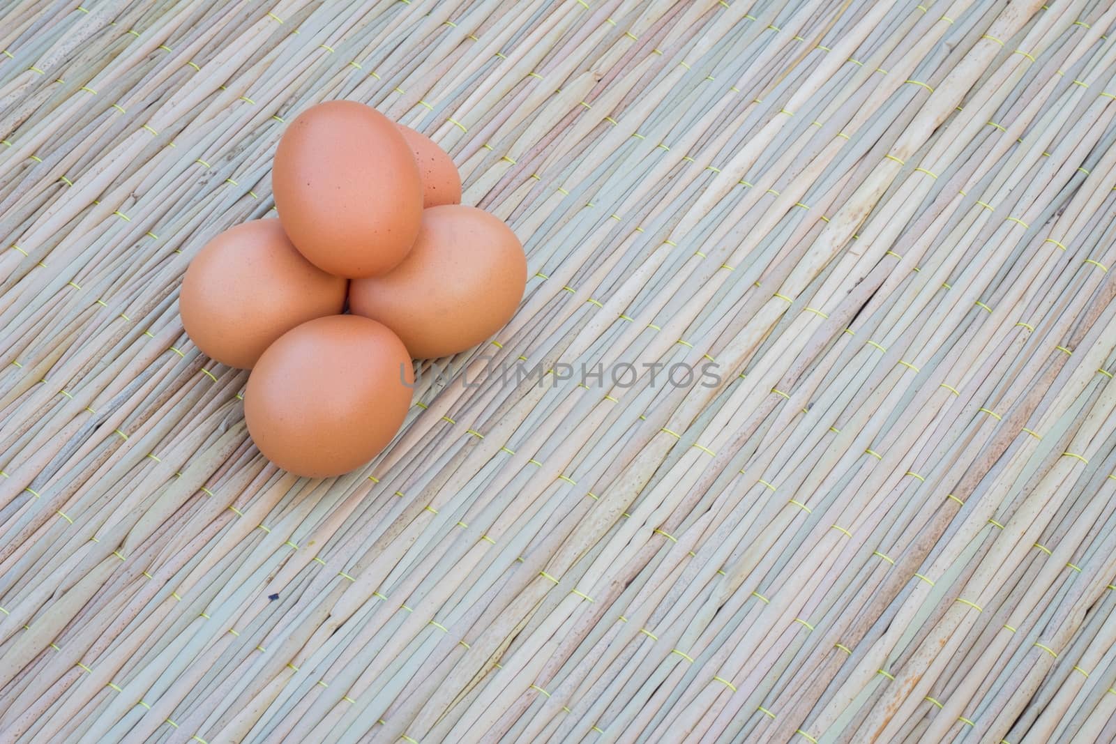 eggs on thai traditional mat  by a3701027
