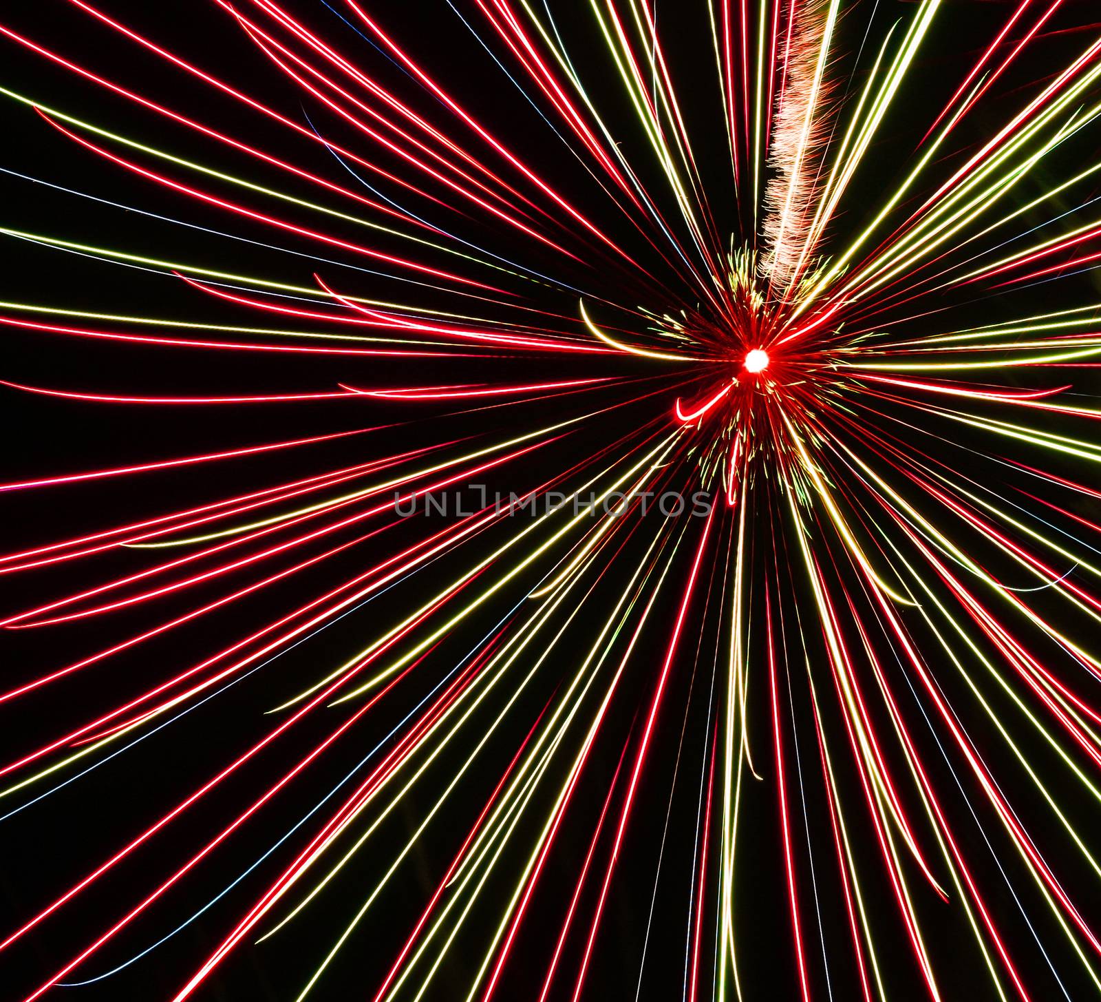 fireworks,colored splashes of light against a dark background