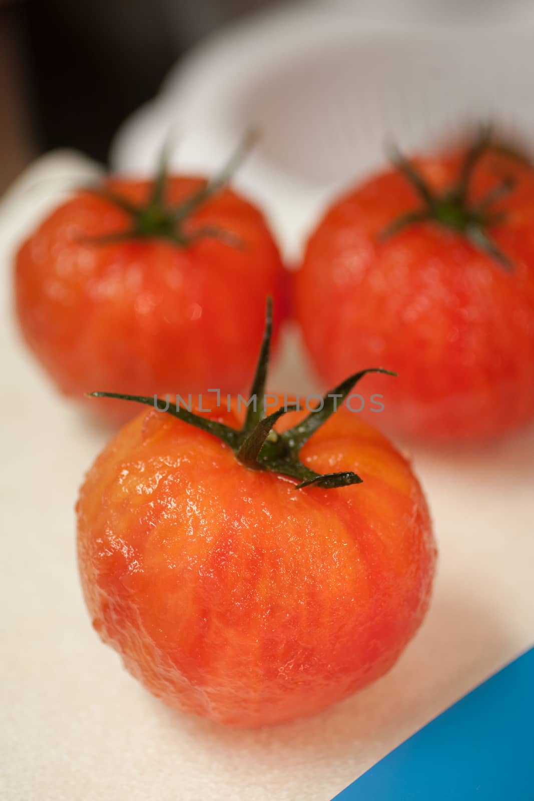 Skinned tomatoes waiting to be chopped.