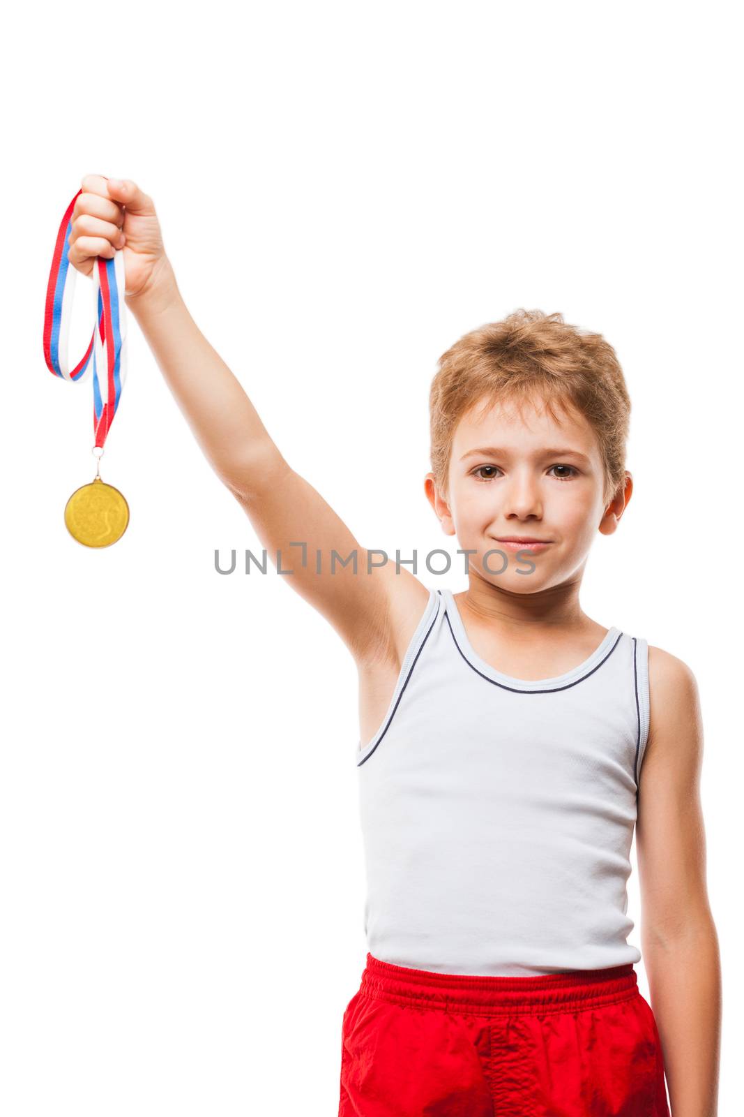 Smiling athlete champion child boy gesturing for victory triumph by ia_64