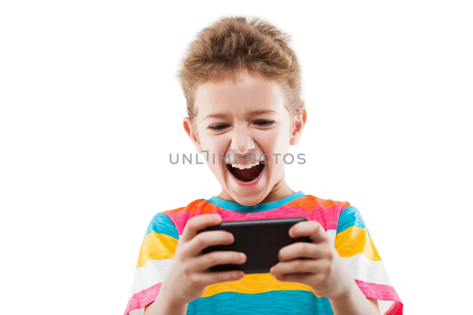 Smiling child boy playing games or surfing internet on smartphon by ia_64