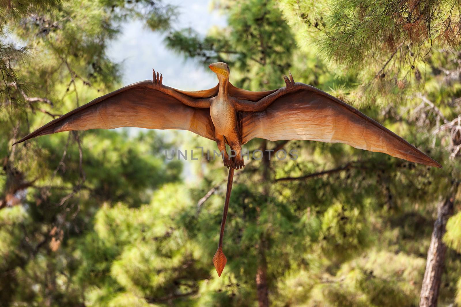 Pterodactyl dinosaur flying at forest by ia_64