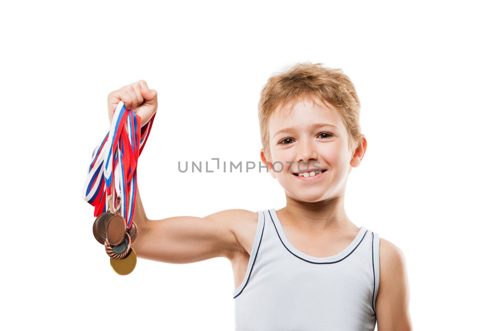 Sport success and win concept - smiling athlete champion child boy hand holding first place victory gold medal award
