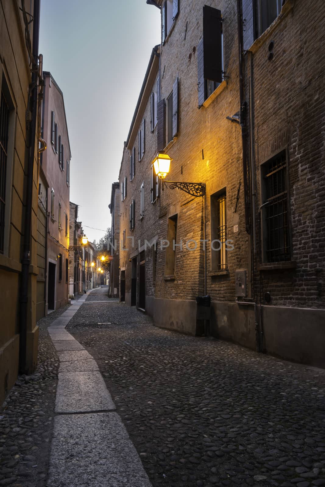 Medieval street in the downtown of Ferrara city