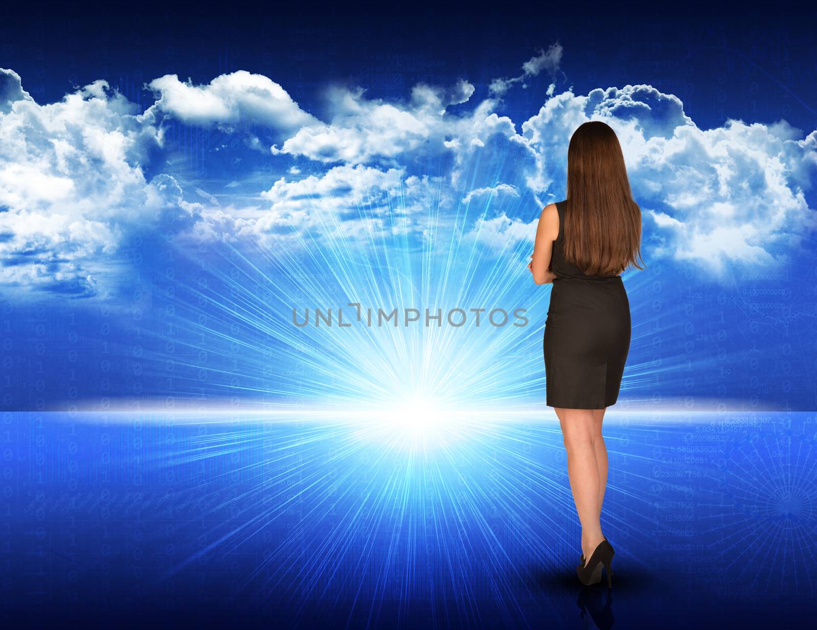 Businesswoman standing against digitally generated spacy blue landscape with rising sun and cloudy sky