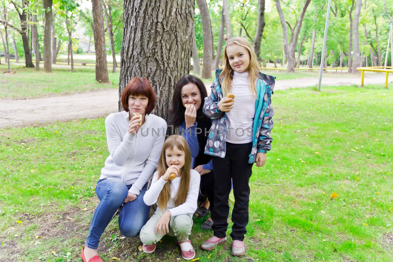 Photo of group people are eating in summer