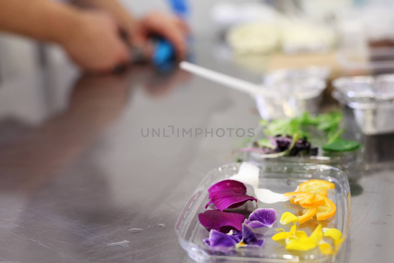 A chef blurred preparing food in restaurant