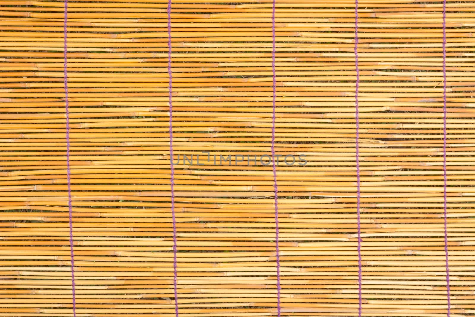 Close up of orange bamboo blind texture