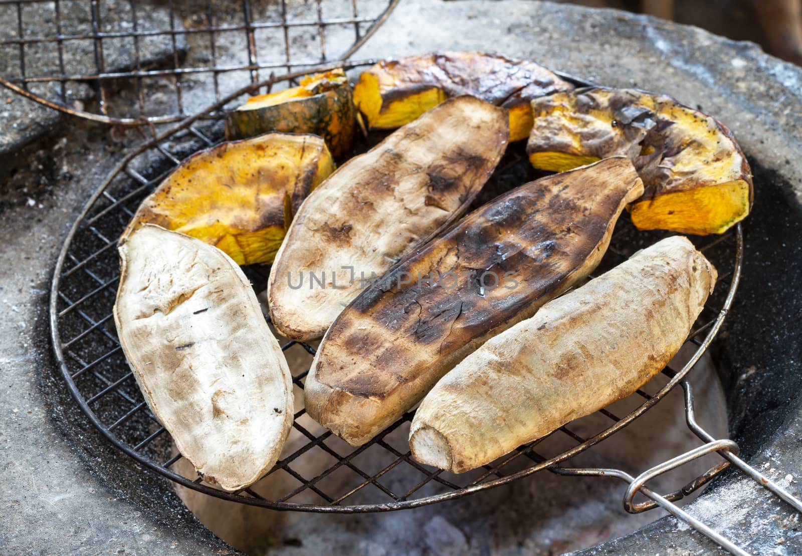 Sweet Potatoes and Pumpkins grilled on stove