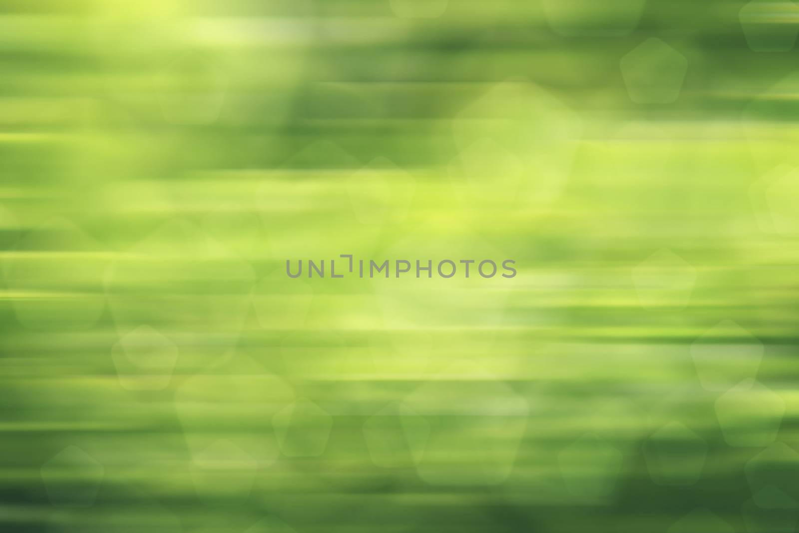 abstract green nature background, pentagon bokeh, fast motion