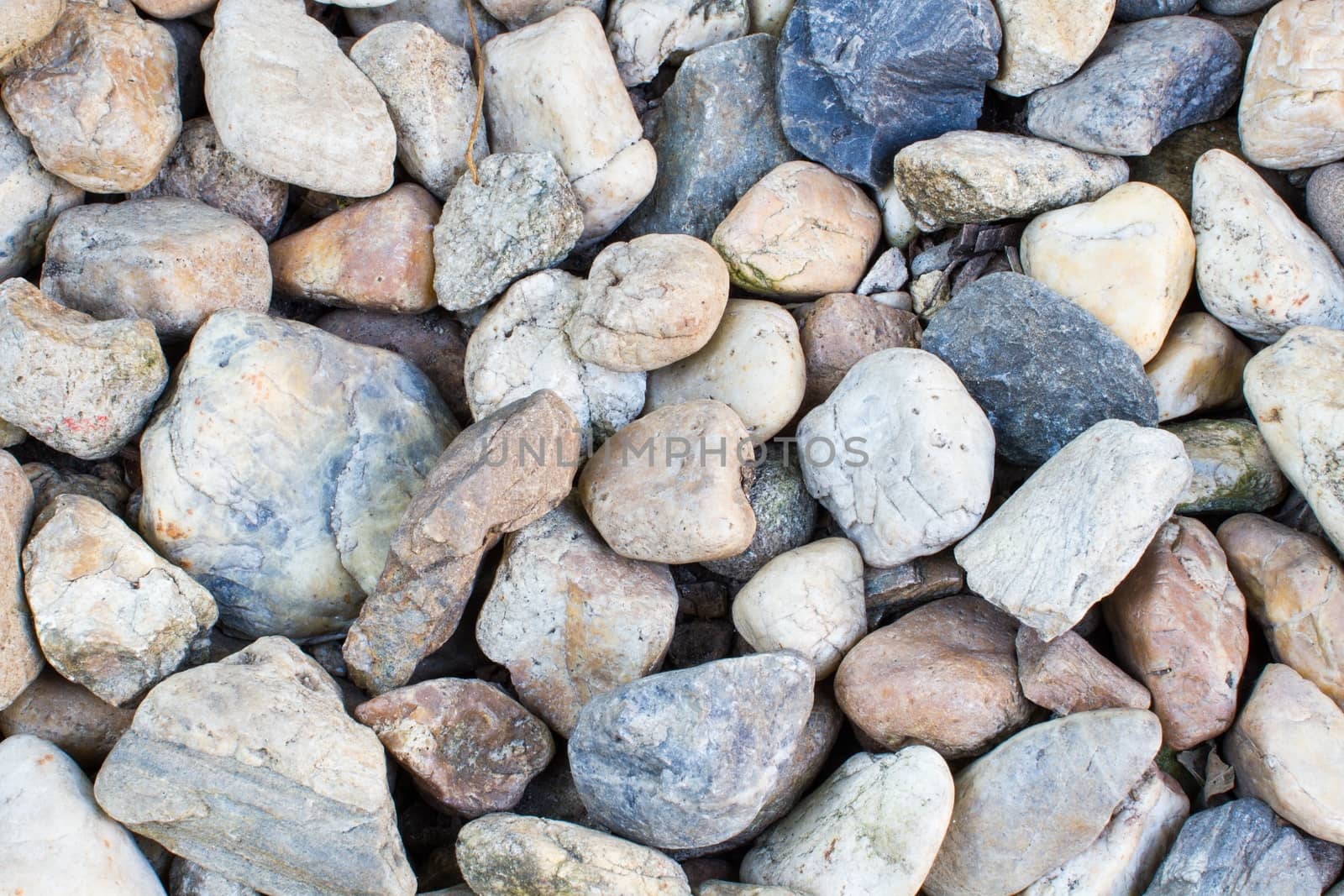 Pebbles as a background image on the ground