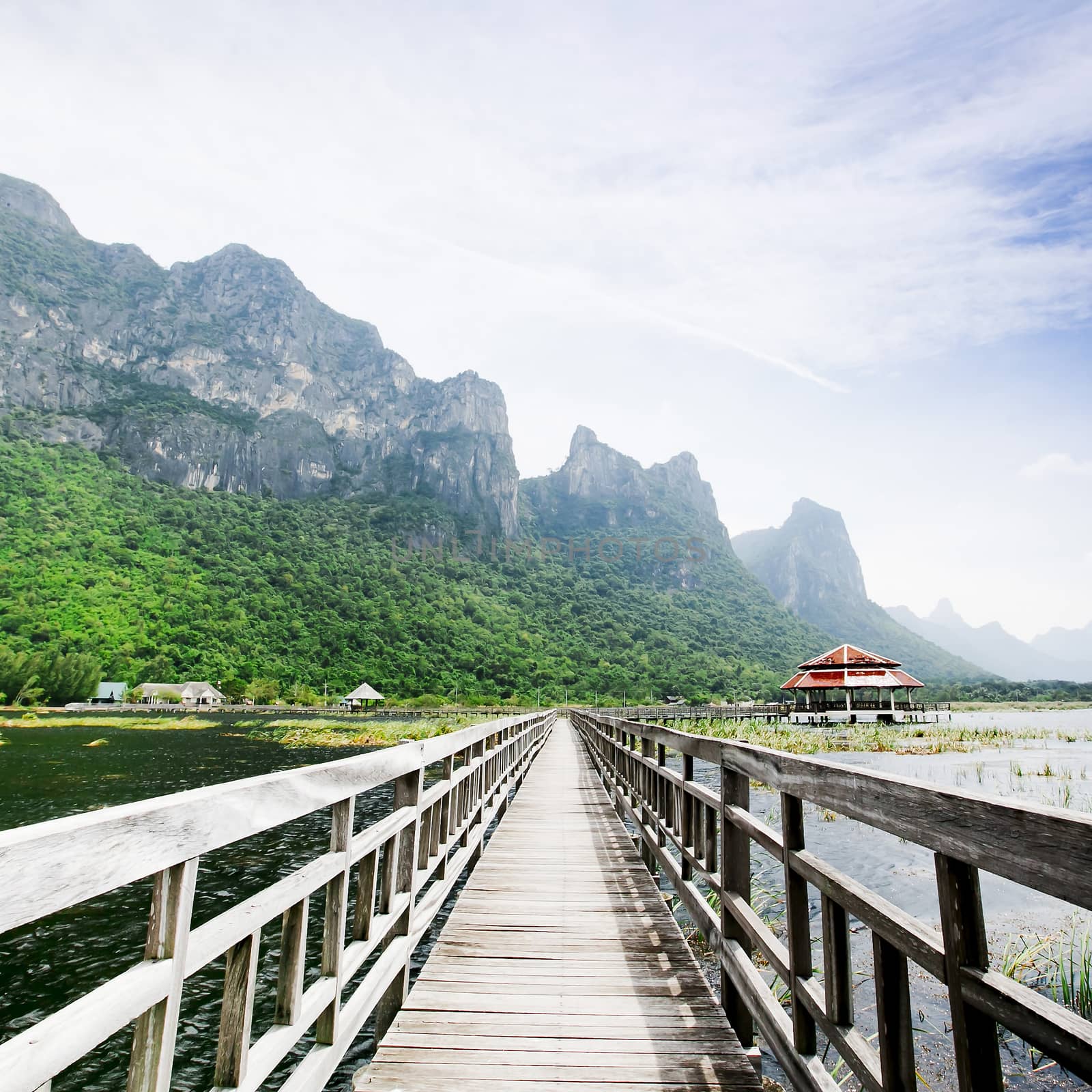 wooden bridge to the rock mountain