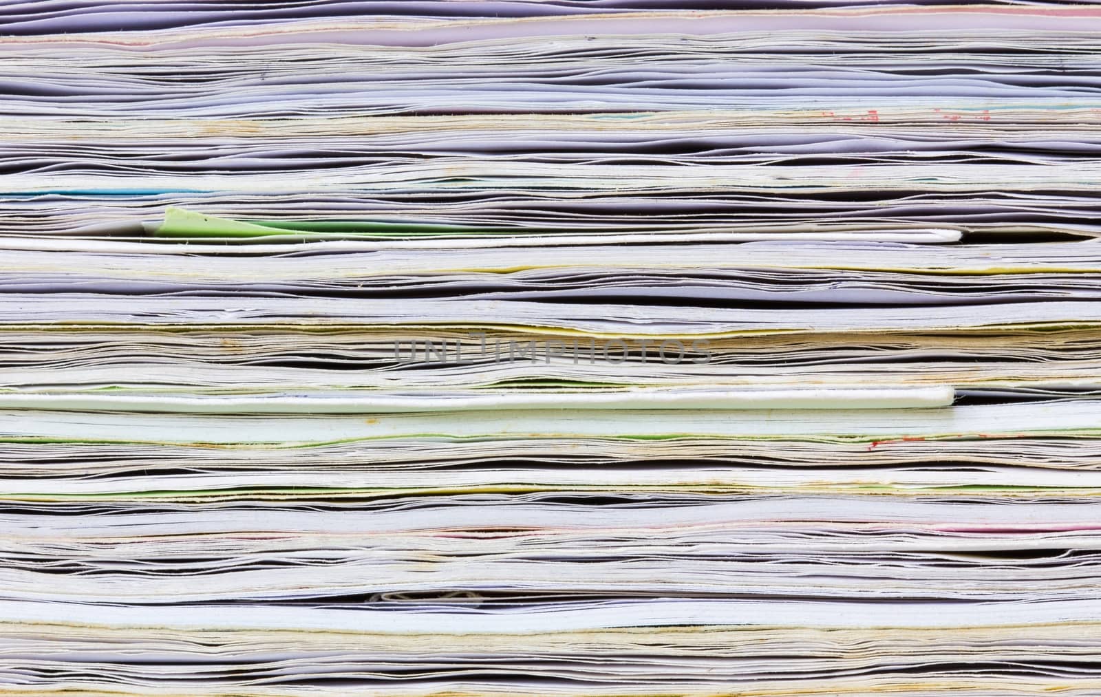 close-up of old colorful notebook spine  by a3701027