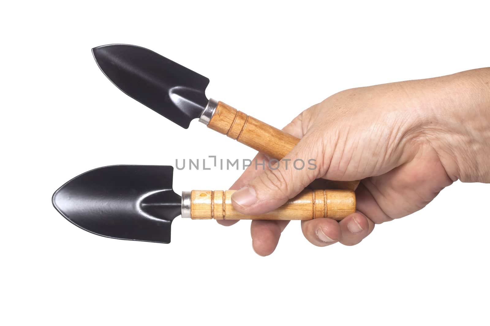 Shovel in hand isolated on white background