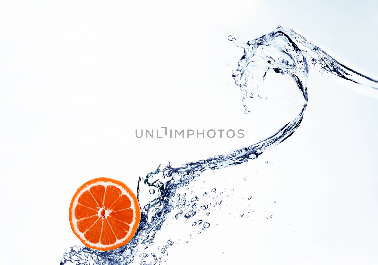 grapefruit in spray of water