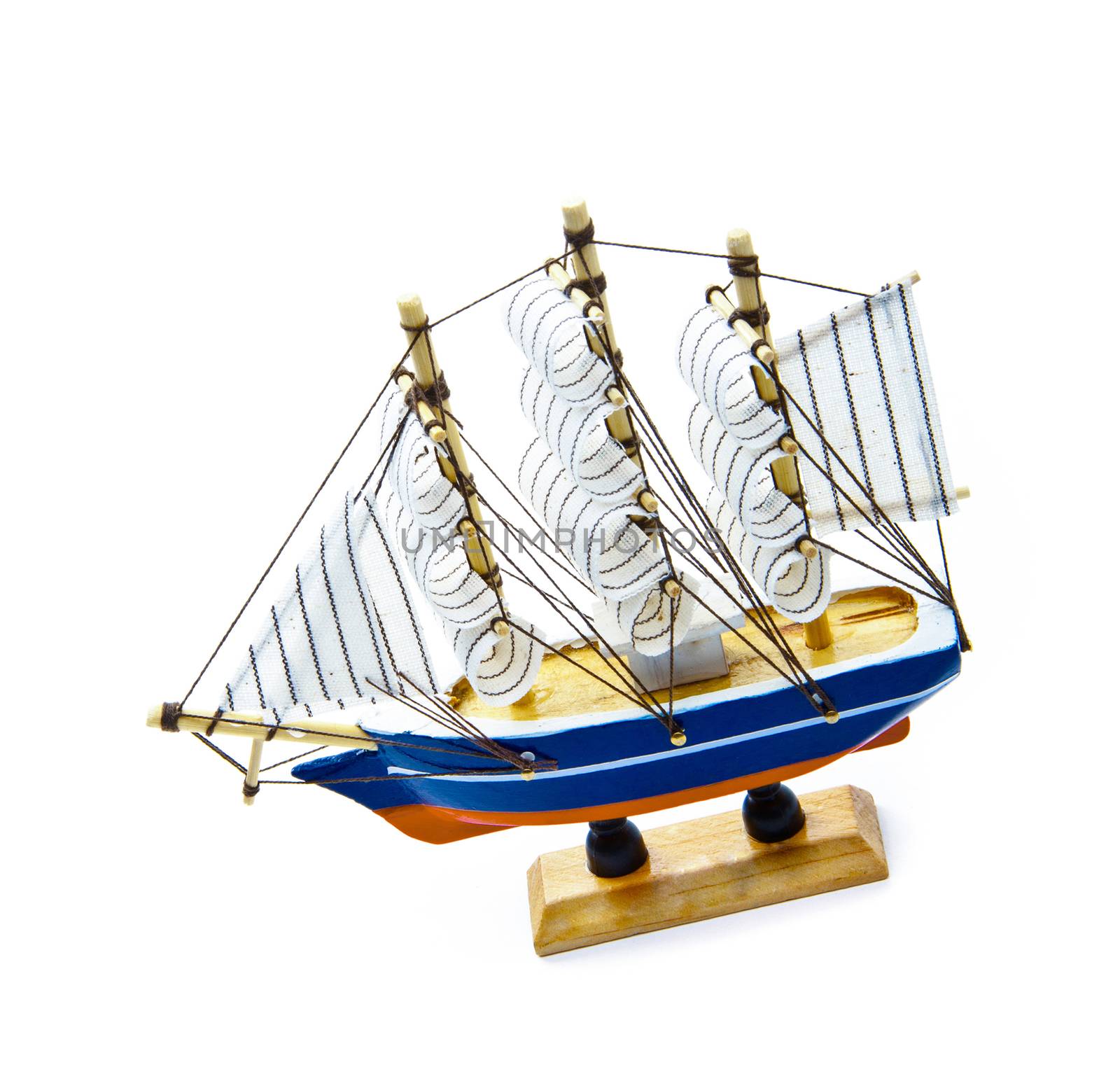 Wooden ship toy model, isolated on white background