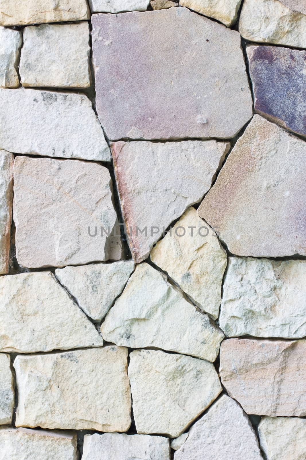 Multi-colored and multi-sized, pale rocks wall grunge texture ba by a3701027