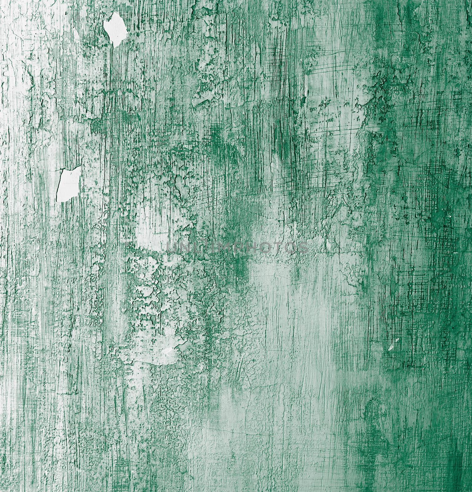 Green and White Cracked Cement Wall Background closeup